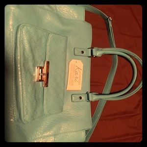 Damsel in defense purse